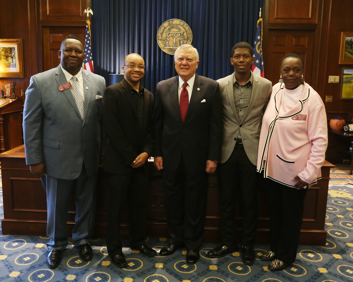 Photograph of Governor Nathan Deal and the Georgia Film Academy representatives for the Feed the Hungry Resolution