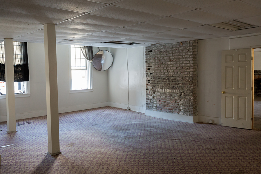 Second floor room of 7 West Bay that will become a library.