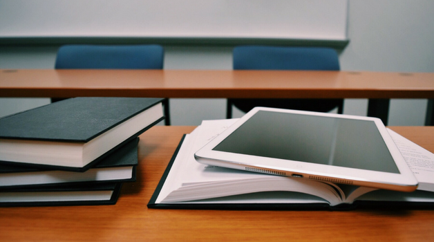 Image of textbooks and iPad